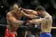 FILE - This May 23, 2015 file photo Chris Weidman, right, and Vitor Belfort trade blows during their middleweight mixed martial arts bout in Las Vegas. The UFC is surging toward the end of the year by flexing its promotional muscles for three straight nights in Vegas. The MGM Grand Garden Arena show has two title fights: Middleweight champion Weidman, defends his belt against Luke Rockhold in a tantalizing style clash pitting two dominant 185-pounders at the peak of their careers. (AP Photo/John Locher,File)