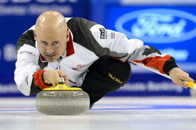 Canada's skip Kevin Koe delivers a stone durign the gold medal game Canada vs Denmark at the World Men's Curling Championships on April 10, 2016 in Basel. / AFP / FABRICE COFFRINI        (Photo credit should read FABRICE COFFRINI/AFP/Getty Images)