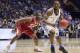 Kentucky forward Edrice Adebayo (3) drives against Arkansas forward Moses Kingsley (33) in the first half of an NCAA college basketball game for the championship of the Southeastern Conference tournament Sunday, March 12, 2017, in Nashville, Tenn. (AP Photo/Wade Payne)