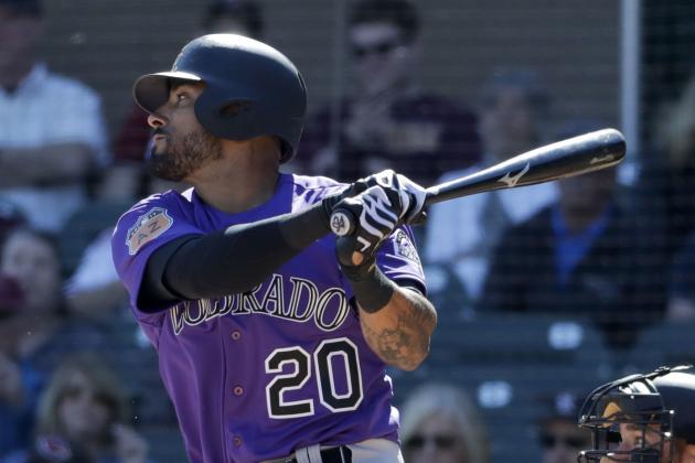 Colorado Rockies' Ian Desmond bats against the Arizona Diamondbacks during a spring baseball game in Scottsdale, Ariz., Saturday, Feb. 25, 2017. (AP Photo/Chris Carlson)