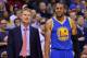 Golden State Warriors head coach Steve Kerr (left) and Warriors guard Andre Iguodala (9) stand together in the second half of an NBA basketball game Tuesday, Dec. 16, 2014, in Memphis, Tenn. (AP Photo/Brandon Dill)