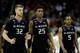 KANSAS CITY, MO - MARCH 10: Dean Wade #32, Wesley Iwundu #25, and Barry Brown #5 of the Kansas State Wildcats walk off the court during a tineout in the semifinal game of the Big 12 Basketball Tournament against the West Virginia Mountaineers at Sprint Center on March 10, 2017 in Kansas City, Missouri. (Photo by Jamie Squire/Getty Images)
