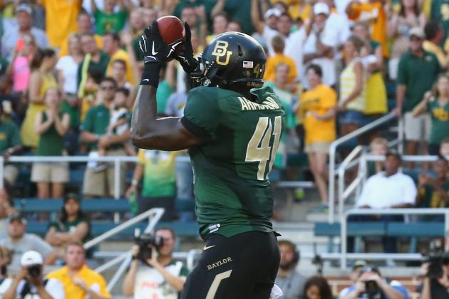 WACO, TX - AUGUST 31:  Tre'Von Armstead #41 of the Baylor Bears makes a touchdown pass reception against the Southern Methodist Mustangs at McLane Stadium on August 31, 2014 in Waco, Texas.  (Photo by Ronald Martinez/Getty Images)