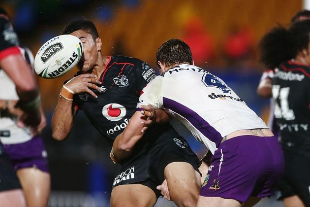 AUCKLAND, NEW ZEALAND - MARCH 10:  Mafoa'aeata Hingano of the Warriors loses the ball in the tackle from Cheyse Blair of the Storm during the round two NRL match between the New Zealand Warriors and the Melbourne Storm at Mt Smart Stadium on March 10, 2017 in Auckland, New Zealand.  (Photo by Anthony Au-Yeung/Getty Images)