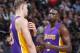 SACRAMENTO, CA - DECEMBER 12: Timofey Mozgov #20 and Luol Deng #9 of the Los Angeles Lakers talk during the game against the Sacramento Kings on December 12, 2016 at Golden 1 Center in Sacramento, California. NOTE TO USER: User expressly acknowledges and agrees that, by downloading and or using this photograph, User is consenting to the terms and conditions of the Getty Images Agreement. Mandatory Copyright Notice: Copyright 2016 NBAE (Photo by Rocky Widner/NBAE via Getty Images)