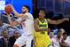 ORLANDO, FL - MARCH 16: Denzel Ingram #10 of the North Carolina-Wilmington Seahawks tries to steal the ball from Darius Thompson #51 of the Virginia Cavaliers during the first round of the 2017 NCAA Men's Basketball Tournament at Amway Center on March 16, 2017 in Orlando, Florida. (Photo by Mike Ehrmann/Getty Images)