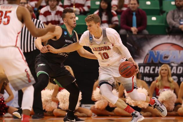 SALT LAKE CITY, UT - MARCH 16: Lauri Markkanen #10 of the Arizona Wildcats is defended by Drick Bernstine #43 of the North Dakota Fighting Sioux during the first round of the 2017 NCAA Men's Basketball Tournament at Vivint Smart Home Arena on March 16, 2017 in Salt Lake City, Utah.  (Photo by Christian Petersen/Getty Images)