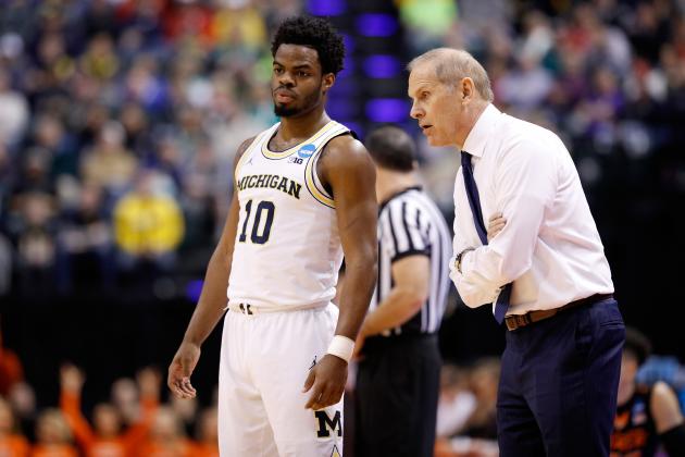 INDIANAPOLIS, IN - MARCH 17:  Head coach John Beilein of the Michigan Wolverines talks with Derrick Walton Jr. #10 in the first half against the Oklahoma State Cowboys during the first round of the 2017 NCAA Men's Basketball Tournament at Bankers Life Fieldhouse on March 17, 2017 in Indianapolis, Indiana.  (Photo by Joe Robbins/Getty Images)