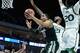 TULSA, OK - MARCH 17: Miles Bridges #22 of the Michigan State Spartans drives to the basket against Kamari Murphy #21 of the Miami (Fl) Hurricanes during the first round of the 2017 NCAA Men's Basketball Tournament at BOK Center on March 17, 2017 in Tulsa, Oklahoma. (Photo by J Pat Carter/Getty Images)
