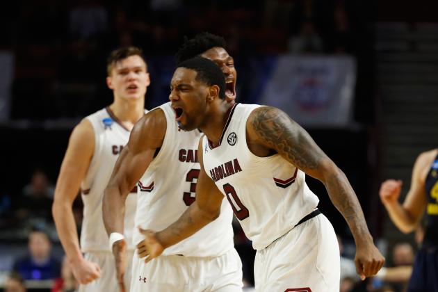 GREENVILLE, SC - MARCH 17: Sindarius Thornwell #0 and Chris Silva #30 of the South Carolina Gamecocks celebrate in the second half against the Marquette Golden Eagles during the first round of the 2017 NCAA Men's Basketball Tournament at Bon Secours Wellness Arena on March 17, 2017 in Greenville, South Carolina. (Photo by Gregory Shamus/Getty Images)
