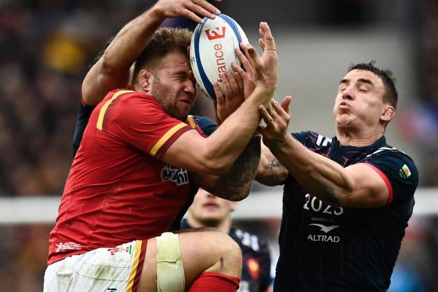 Wales' prop Tomas Francis (L) jumps to grab the ball despite France's flanker Louis Picamoles  during the Six Nations tournament Rugby Union match between France and Wales at the Stade de France in Saint-Denis, outside Paris, on March 18, 2017.  / AFP PHOTO / CHRISTOPHE SIMON        (Photo credit should read CHRISTOPHE SIMON/AFP/Getty Images)
