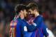 Barcelona's Portuguese midfielder Andre Gomes (L) celebrates with Barcelona's defender Gerard Pique (R) after scoring a goal during the Spanish league football match FC Barcelona vs Valencia CF at the Camp Nou stadium in Barcelona on March 19, 2017. / AFP PHOTO / LLUIS GENE (Photo credit should read LLUIS GENE/AFP/Getty Images)