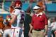 DALLAS, TX - OCTOBER 10: Head coach Bob Stoops of the Oklahoma Sooners looks on as Baker Mayfield #6 of the Oklahoma Sooners works through pregame warmups before taking on the Texas Longhorns during the AT&T Red River Showdown at the Cotton Bowl on October 10, 2015 in Dallas, Texas. (Photo by Tom Pennington/Getty Images)