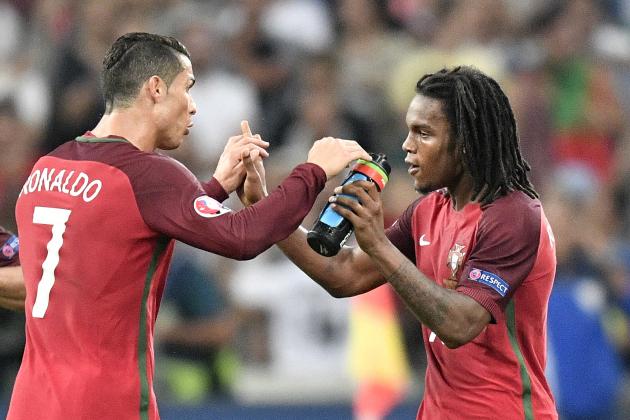 Portugal's Cristiano Ronaldo, left, congratulates Renato Sanches who scored their first goal during the Euro 2016 quarterfinal soccer match between Poland and Portugal, at the Velodrome stadium in Marseille, France, Thursday, June 30, 2016. (AP Photo/Martin Meissner)