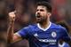 Chelsea's Brazilian-born Spanish striker Diego Costa celebrates their second goal during the English Premier League football match between Stoke City and Chelsea at the Bet365 Stadium in Stoke-on-Trent, central England on March 18, 2017. / AFP PHOTO / Oli SCARFF / RESTRICTED TO EDITORIAL USE. No use with unauthorized audio, video, data, fixture lists, club/league logos or 'live' services. Online in-match use limited to 75 images, no video emulation. No use in betting, games or single club/league/player publications. / (Photo credit should read OLI SCARFF/AFP/Getty Images)