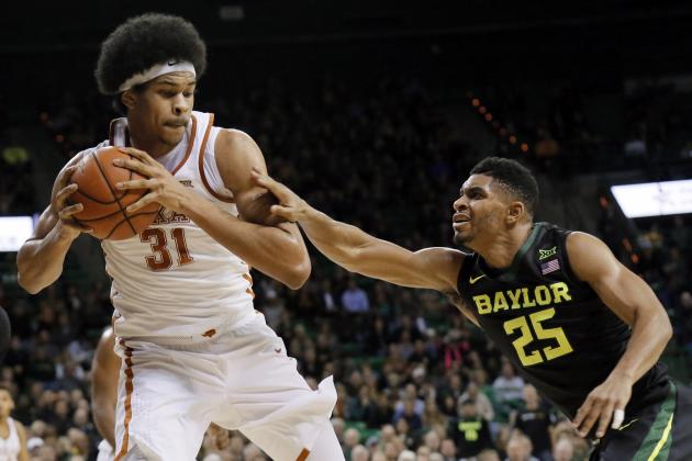 Texas forward Jarrett Allen (31) comes down with an offensive rebound in front of Baylor's Al Freeman (25) in the first half of an NCAA college basketball game, Tuesday, Jan. 17, 2017, in Waco, Texas. (AP Photo/Tony Gutierrez)