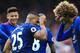 Manchester United's Ecuadorian midfielder Antonio Valencia (2nd L) celebrates with Manchester United's Belgian midfielder Marouane Fellaini (R) after scoring their third goal during the English Premier League football match between Middlesbrough and Manchester United at Riverside Stadium in Middlesbrough, north east England on March 19, 2017.
Manchester United won the game 3-1. / AFP PHOTO / Lindsey PARNABY / RESTRICTED TO EDITORIAL USE. No use with unauthorized audio, video, data, fixture lists, club/league logos or 'live' services. Online in-match use limited to 75 images, no video emulation. No use in betting, games or single club/league/player publications. / (Photo credit should read LINDSEY PARNABY/AFP/Getty Images)