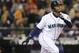 FILE - This is an Oct. 3, 2009, file photo showing Seattle Mariners' Ken Griffey Jr. hitting a solo home run on a pitch from Texas Rangers' Tommy Hunter during the fourth inning of a baseball game in Seattle. Griffey will be inducted into the Baseball Hall of Fame in Cooperstown, N.Y. on Sunday, July 24, 2016. (AP Photo/John Froschauer, File)