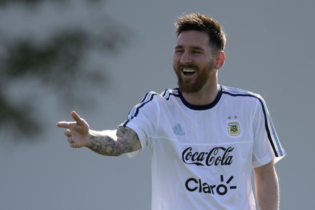 Argentina's forward Lionel Messi laughs during a training session in Ezeiza, Buenos Aires, on March 21, 2017 ahead of their World Cup South American qualifier football matches against Chile and Venezuela.  / AFP PHOTO / Juan MABROMATA        (Photo credit should read JUAN MABROMATA/AFP/Getty Images)