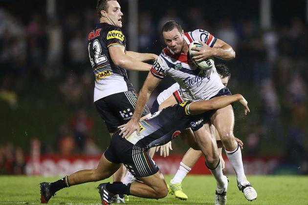SYDNEY, AUSTRALIA - MARCH 18: Boyd Cordner of the Roosters is tackled during the round three NRL match between the Penrith Panthers and the Sydney Roosters at Pepper Stadium on March 18, 2017 in Sydney, Australia. (Photo by Mark Metcalfe/Getty Images)