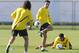 Spain's FC Barcelona Carles Puyol (L), Xavi (C) and Dani Alves (R) take part in a training in Yoikohama, suburban Tokyo, on December 12, 2011. FC Barcelona will play against Asian champion Qatar's Al-Ssad at the semi-final of the FIFA Club World Cup here on December 14. AFP PHOTO/Toru YAMANAKA (Photo credit should read TORU YAMANAKA/AFP/Getty Images)