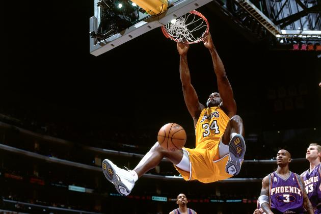 LOS ANGELES - 2004:  Shaquille O'Neal #34 of the Los Angeles Lakers dunks against the Phoenix Suns during an NBA game circa 2004 at the Staples Center in Los Angeles, California.  NOTE TO USER: User expressly acknowledges and agrees that, by downloading and/or using this Photograph, User is consenting to the terms and conditions of the Getty Images License Agreement. Mandatory Copyright Notice: Copyright 2004 NBAE (Photo by Andrew D. Bernstein/NBAE via Getty Images)