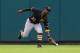 ST. LOUIS, MO - OCTOBER 2: Andrew McCutchen #22 of the Pittsburgh Pirates misplays a fly ball against the St. Louis Cardinals in the third inning at Busch Stadium on October 2, 2016 in St. Louis, Missouri. (Photo by Dilip Vishwanat/Getty Images)