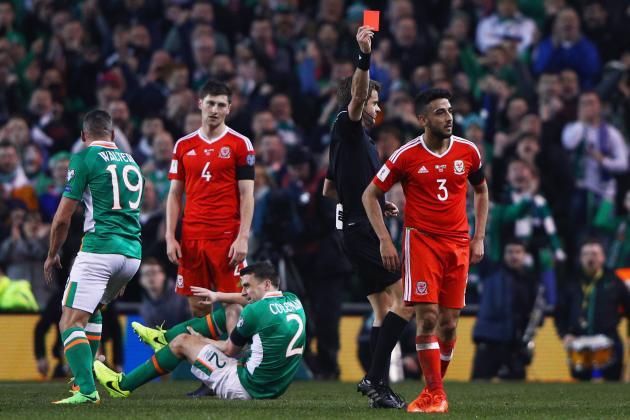DUBLIN, IRELAND - MARCH 24: Players react as Neil Taylor of Wales (3) is shown a red card by referee Nicola Rizzoli and is sent off after a challenge on Seamus Coleman of the Republic of Ireland (2) during the FIFA 2018 World Cup Qualifier between Republic of Ireland and Wales at Aviva Stadium on March 24, 2017 in Dublin, Ireland. (Photo by Ian Walton/Getty Images)