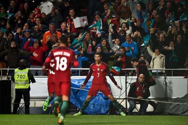 Portugal's forward Cristiano Ronaldo celebrates after scoring during the WC 2018 group B football qualifing match Portugal vs Hungary at the Luz stadium in Lisbon on March 25, 2017. / AFP PHOTO / PATRICIA DE MELO MOREIRA        (Photo credit should read PATRICIA DE MELO MOREIRA/AFP/Getty Images)