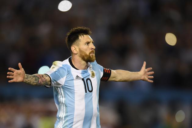 Argentina's Lionel Messi celebrates after scoring against Chile during their 2018 FIFA World Cup qualifier football match at the Monumental stadium in Buenos Aires, Argentina, on March 23, 2017. / AFP PHOTO / EITAN ABRAMOVICH        (Photo credit should read EITAN ABRAMOVICH/AFP/Getty Images)