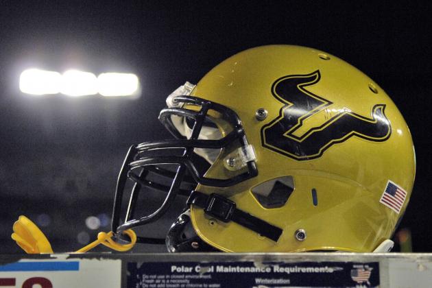 TAMPA, FL - SEPTEMBER 12:  Detail view of a football helmet of the University of South Florida Bulls resting behind the bench during play against the Kansas University Jayhawks at Raymond James Stadium on September 12, 2008 in Tampa, Florida.  (Photo by Al Messerschmidt/Getty Images)