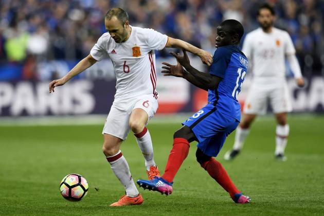 France's midfielder N'Golo Kante (R) vies with Spain's Andres Iniesta during the friendly football match France vs Spain on March 28, 2017 at the Stade de France stadium in Saint-Denis, north of Paris. / AFP PHOTO / CHRISTOPHE SIMON (Photo credit should read CHRISTOPHE SIMON/AFP/Getty Images)