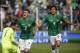 Bolivia's Juan Carlos Arce (7) celebrates scoring his side's first goal against Argentina, followed by teammate Marcelo Martins, during a 2018 World Cup qualifying match in La Paz, Bolivia, on Tuesday, March 28, 2017. (AP Photo/Victor R. Caivano)