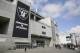 Two boys throw a football outside the Oakland Coliseum before the start of a rally to keep the Oakland Raiders from moving Saturday, March 25, 2017, in Oakland, Calif. NFL owners are expected to vote on the team's possible relocation to Las Vegas Monday or Tuesday at their meeting in Phoenix. (AP Photo/Eric Risberg)