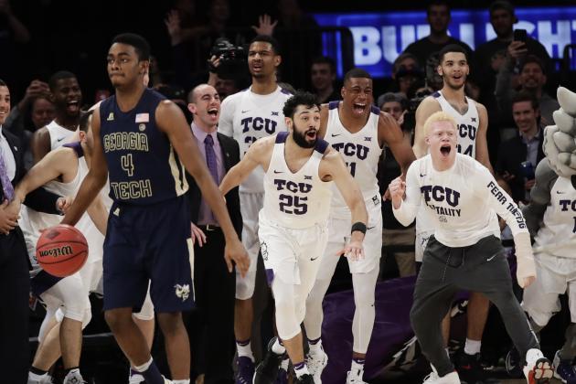 TCU celebrates as Georgia Tech's Norman Harris (4) brings the ball down the court as time runs out in the second half of an NCAA college basketball game in the final of the NIT Thursday, March 30, 2017, in New York. (AP Photo/Frank Franklin II)