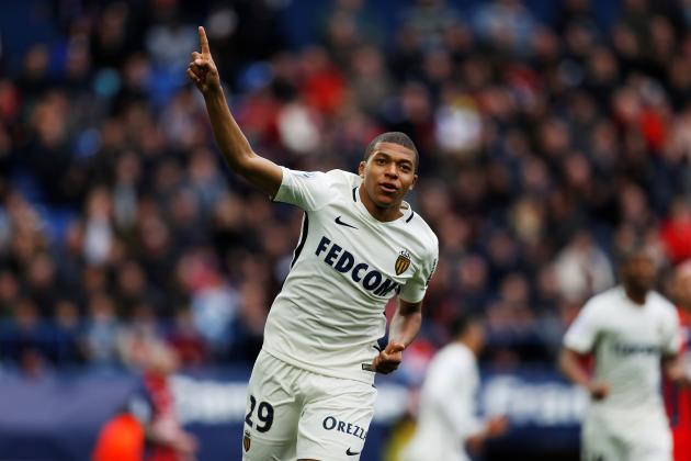 Monaco's French forward Kylian Mbappe Lottin celebrates after scoring a goal during the French L1 football match between Caen (SMC) and Monaco (AS), on March 19, 2017 at the Michel d'Ornano stadium, in Caen, northwestern France. / AFP PHOTO / CHARLY TRIBALLEAU (Photo credit should read CHARLY TRIBALLEAU/AFP/Getty Images)