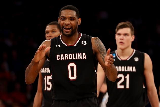 NEW YORK, NY - MARCH 26:  Sindarius Thornwell #0 of the South Carolina Gamecocks reacts in the second half with teammates PJ Dozier #15 and Maik Kotsar #21 against the Florida Gators during the 2017 NCAA Men's Basketball Tournament East Regional at Madison Square Garden on March 26, 2017 in New York City.  (Photo by Elsa/Getty Images)