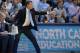 CHAPEL HILL, NC - FEBRUARY 20: Assistant coach C.B. McGrath of the North Carolina Tar Heels directs players during their game against the Miami Hurricanes at the Dean Smith Center on February 20, 2016 in Chapel Hill, North Carolina. North Carolina won 96-71. (Photo by Grant Halverson/Getty Images)