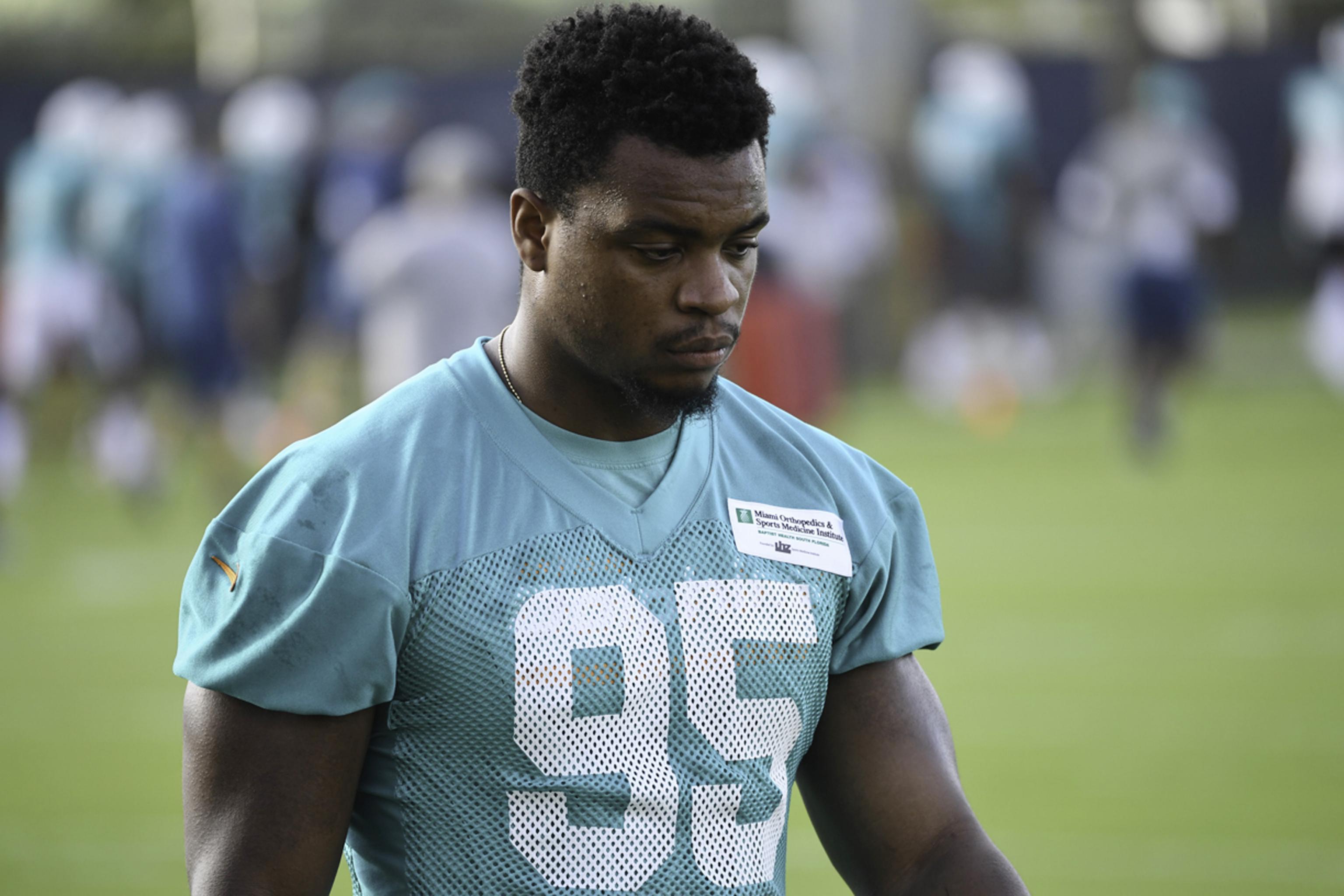 Miami Dolphins defensive end Dion Jordan is shown during mini-camp,  Thursday, June 19, 2014 at the Dolphins Training Facility in Davie, Fla.  (AP Photo/Wilfredo Lee Stock Photo - Alamy