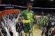 Oregon guard Tyler Dorsey cuts down the net after a regional final against Kansas in the NCAA men's college basketball tournament, Saturday, March 25, 2017, in Kansas City, Mo. (AP Photo/Charlie Riedel)