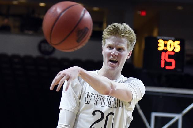 Wyoming forward Hayden Dalton passes the ball against Southern California during the second half of an NCAA college basketball game Friday, Dec. 23, 2016, in Las Vegas. Southern California won 94-92 in overtime. (AP Photo/David Becker)