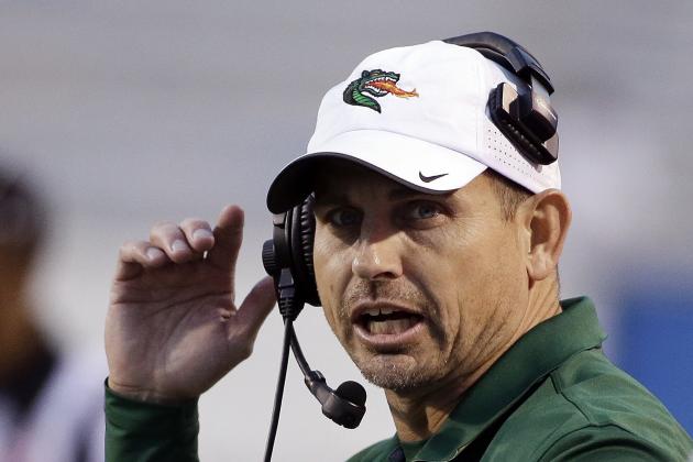 FILE - In this Oct. 18, 2014, file photo, UAB coach Bill Clark watches from the sideline during an NCAA college football game against Middle Tennessee in Murfreesboro, Tenn. UAB's recruiting class won't be highly ranked but it figures to be huge, literally and figuratively, for a program that was eliminated and reinstated over the past 14 months. The Blazers could have nearly 50 signees, including 19 mid-year enrollees. The Blazers will resume playing in the 2017 season. (AP Photo/Mark Humphrey, File)