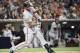 SAN DIEGO, CA - SEPTEMBER 24: Madison Bumgarner #40 of the San Francisco Giants hits double during the fourth inning of a baseball game against the San Diego Padres at PETCO Park on September 24, 2016 in San Diego, California. (Photo by Denis Poroy/Getty Images)