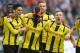 TOPSHOT - Dortmund's Gabonese striker Pierre-Emerick Aubameyang (C) wears a mask as he celebrates with his teammates Dortmund's after scoring the 0-1 during the German first division Bundesliga football match between FC Schalke 04 and Borussia Dortmund in Gelsenkirchen, western Germany, on April 1, 2017. / AFP PHOTO / PATRIK STOLLARZ / RESTRICTIONS: DURING MATCH TIME: DFL RULES TO LIMIT THE ONLINE USAGE TO 15 PICTURES PER MATCH AND FORBID IMAGE SEQUENCES TO SIMULATE VIDEO. == RESTRICTED TO EDITORIAL USE == FOR FURTHER QUERIES PLEASE CONTACT DFL DIRECTLY AT + 49 69 650050
(Photo credit should read PATRIK STOLLARZ/AFP/Getty Images)