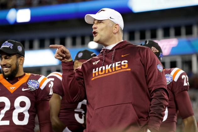 CHARLOTTE, NC - DECEMBER 29:  Head coach Justin Fuente of the Virginia Tech Hokies celebrates after defeating the Arkansas Razorbacks 35-24 in the Belk Bowl at Bank of America Stadium on December 29, 2016 in Charlotte, North Carolina.  (Photo by Streeter Lecka/Getty Images)