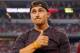 ARLINGTON, TX - SEPTEMBER 27: Johnny Manziel #2 of the Cleveland Browns reacts after receiving his Aggie Ring during half time of the Southwest Classic at AT&T Stadium on September 27, 2014 in Arlington, Texas. (Photo by Tom Pennington/Getty Images)