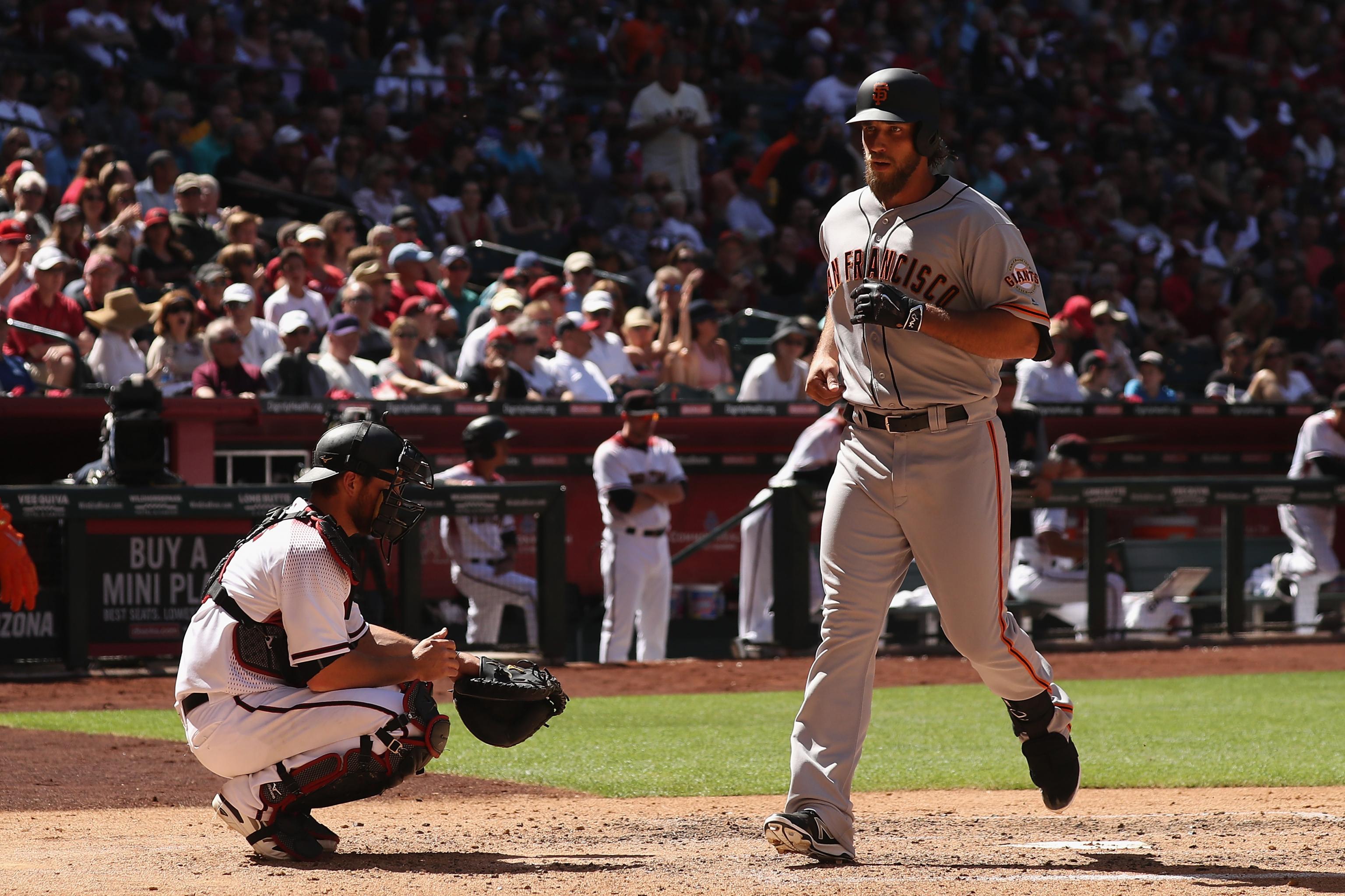 Madison Bumgarner doubles in first at-bat as Giants decline DH