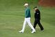 AUGUSTA, GA - APRIL 06: Dustin Johnson of the United States walks with coach Butch Harmon on the range prior to his tee time for the first round of the 2017 Masters Tournament at Augusta National Golf Club on April 6, 2017 in Augusta, Georgia. (Photo by Rob Carr/Getty Images)