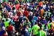 Runners compete in the 41st Paris Marathon at the Champs-Elysees in Paris on April 9, 2017. / AFP PHOTO / FRANCK FIFE (Photo credit should read FRANCK FIFE/AFP/Getty Images)