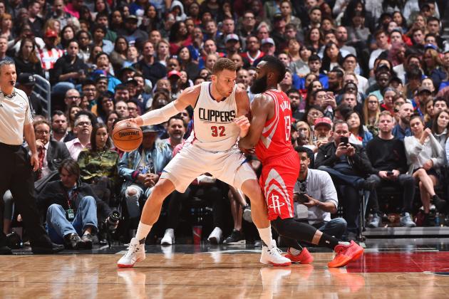 LOS ANGELES, CA - APRIL 10:  Blake Griffin #32 of the LA Clippers handles the ball against James Harden #13 of the Houston Rockets during a game on April 10, 2017 at STAPLES Center in Los Angeles, California. NOTE TO USER: User expressly acknowledges and agrees that, by downloading and/or using this photograph, user is consenting to the terms and conditions of the Getty Images License Agreement. Mandatory Copyright Notice: Copyright 2017 NBAE (Photo by Andrew D. Bernstein/NBAE via Getty Images)